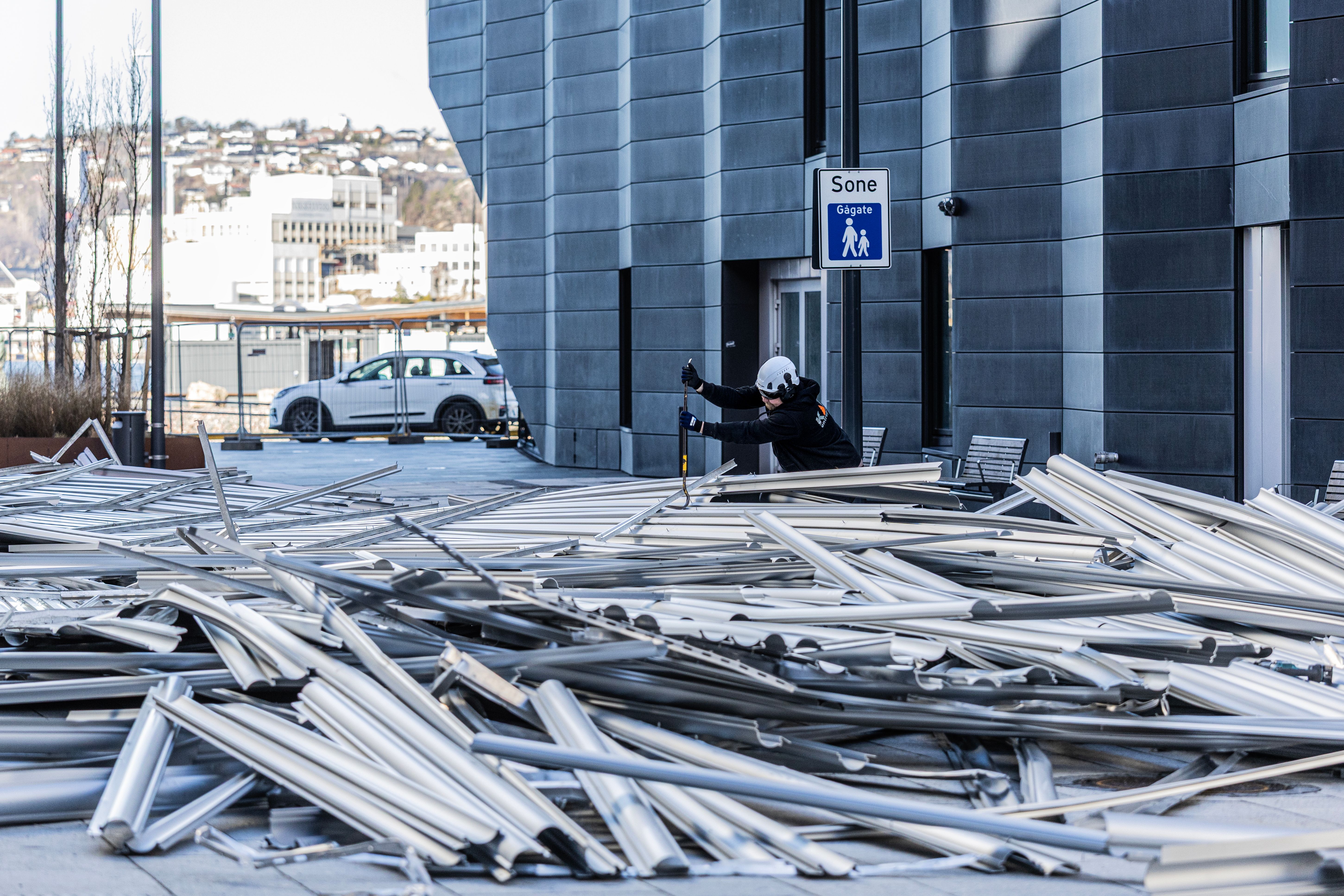 Dette mener de er årsaken til fasade-kollapsen